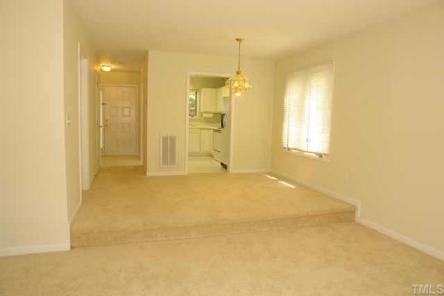 4211 Sunshadow Lane Raleigh, NC 27613 - Photo 5 of 10 a bathroom with a shower