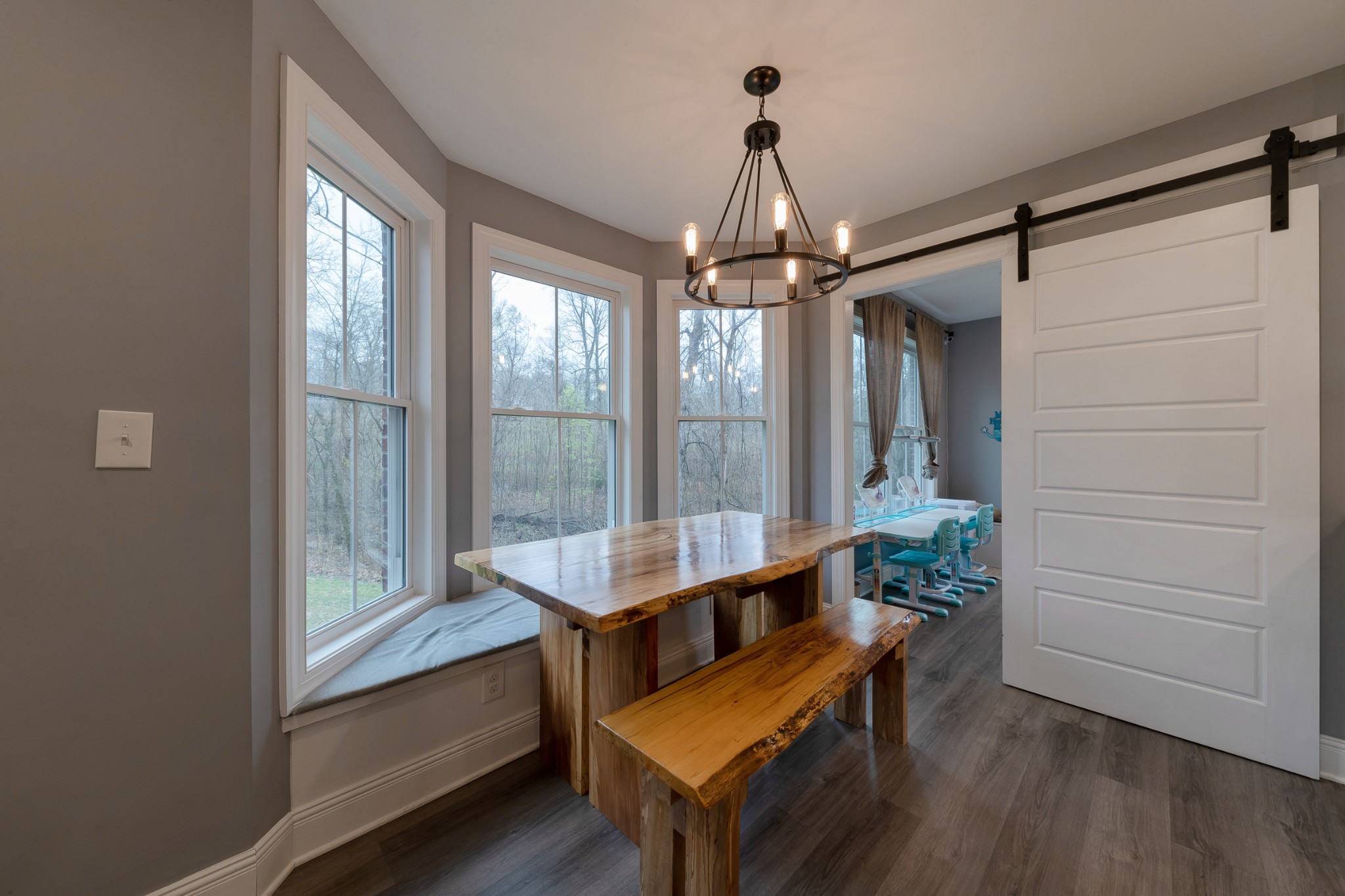 7452 South Swift Road Goodlettsville, TN 37072 - Photo 15 of 37 a living room with furniture and a chandelier