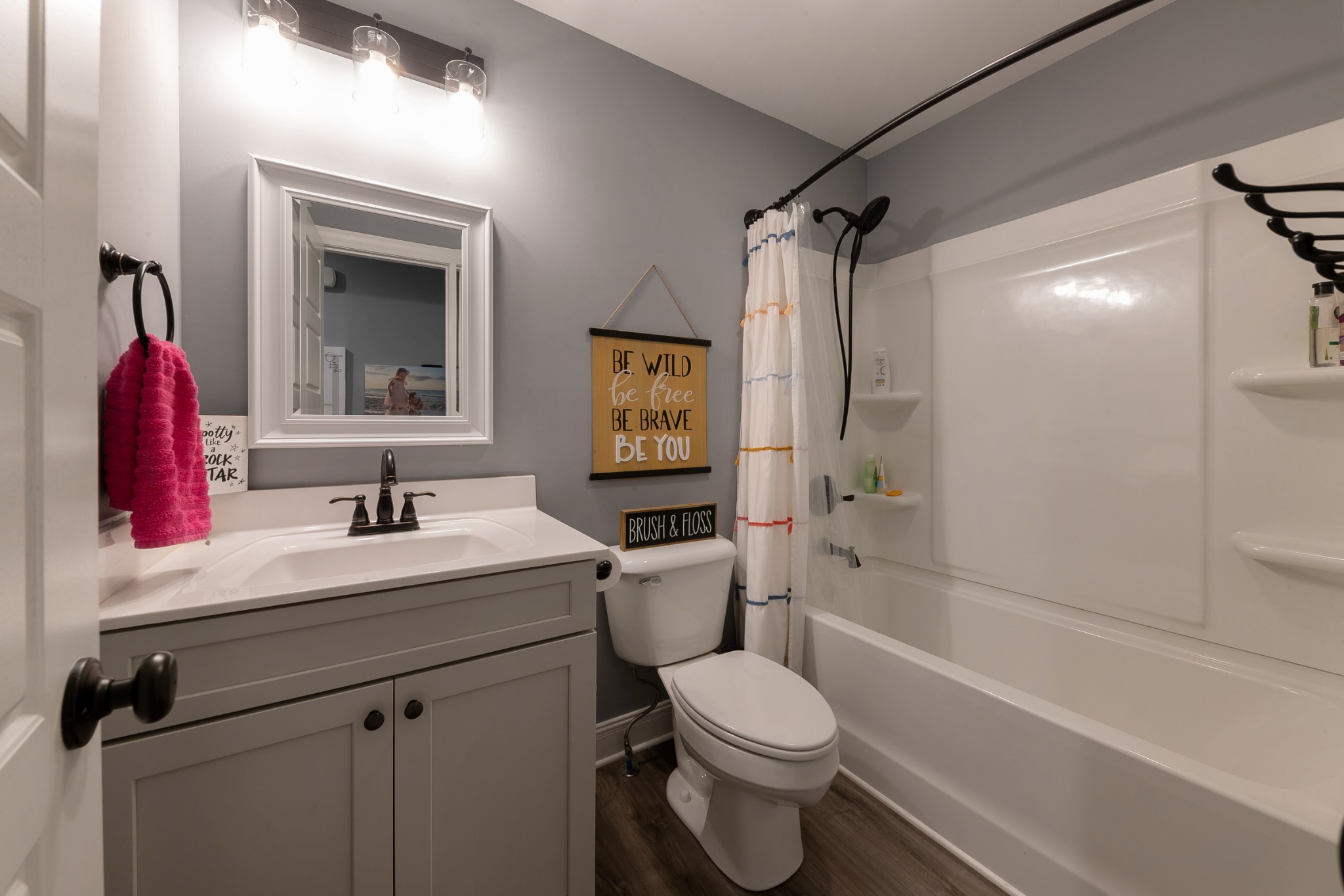 7452 South Swift Road Goodlettsville, TN 37072 - Photo 21 of 37 a bathroom with a sink vanity mirror and toilet