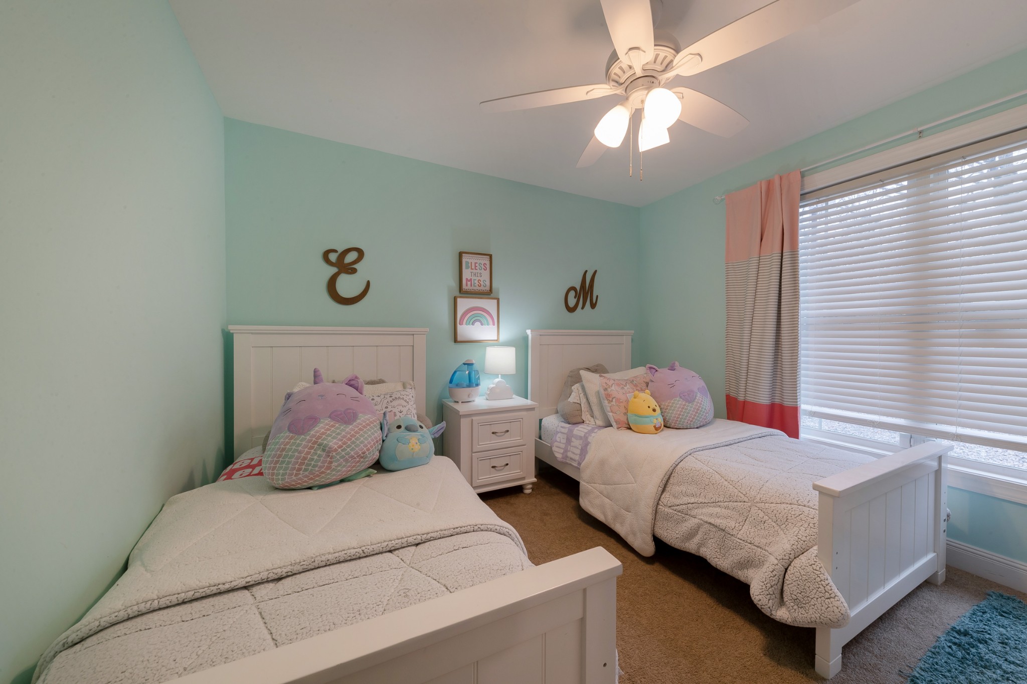 7452 South Swift Road Goodlettsville, TN 37072 - Photo 22 of 37 a bedroom with two beds and a chandelier