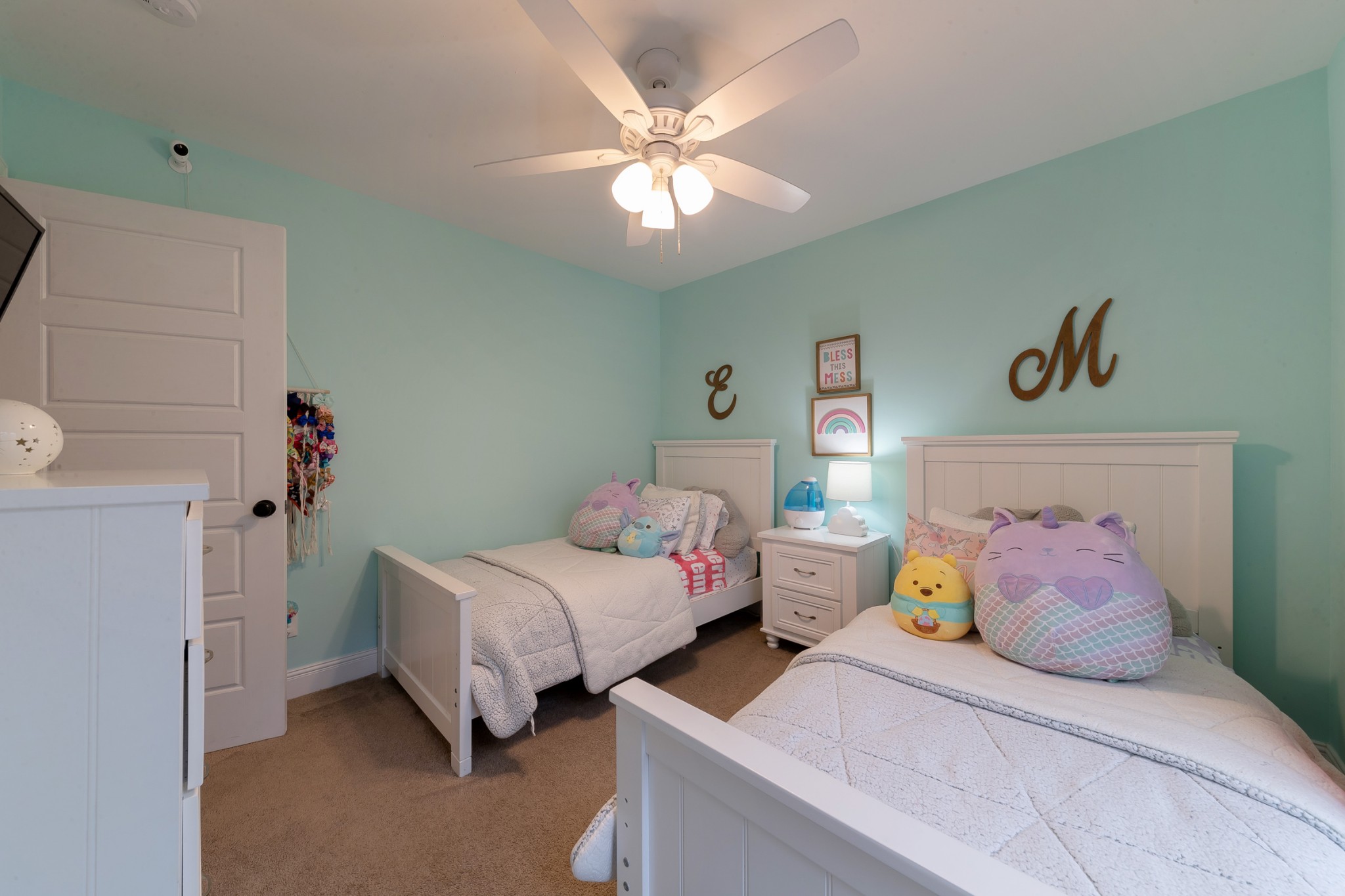 7452 South Swift Road Goodlettsville, TN 37072 - Photo 23 of 37 a bedroom with two beds and a chandelier