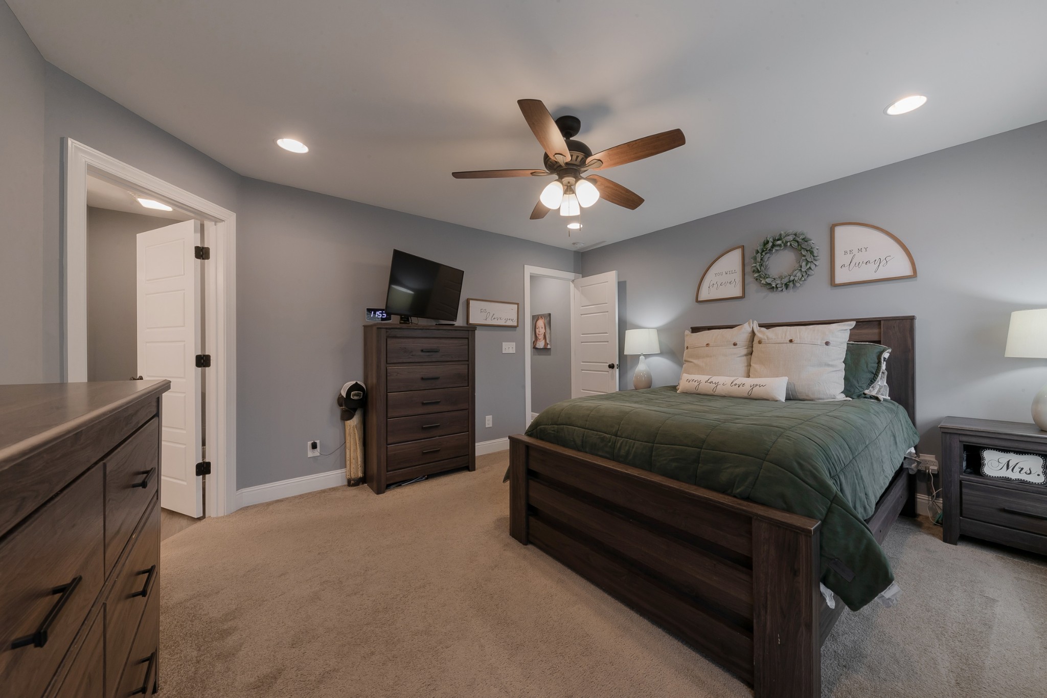 7452 South Swift Road Goodlettsville, TN 37072 - Photo 26 of 37 a bedroom with a bed and a chandelier
