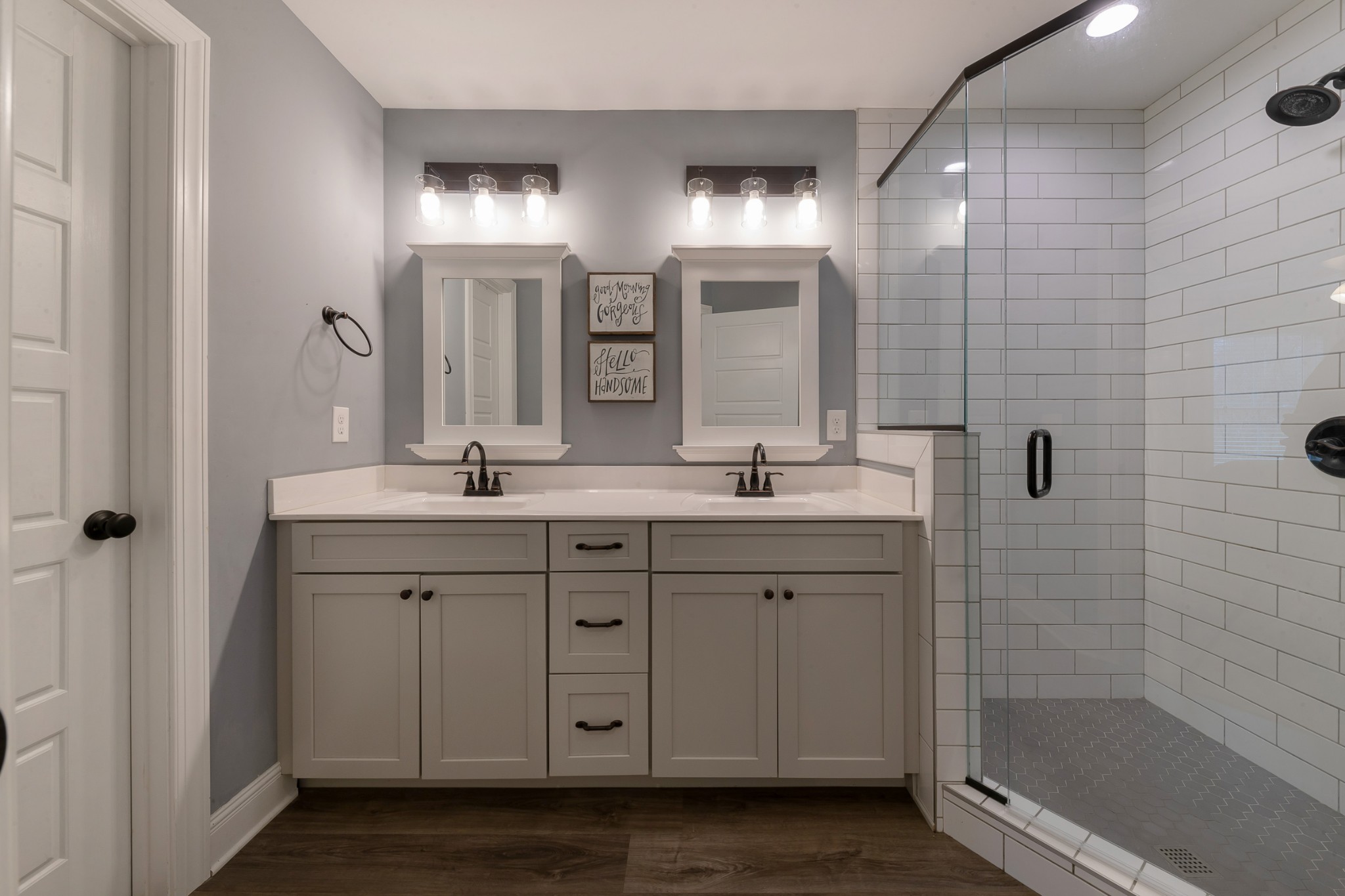 7452 South Swift Road Goodlettsville, TN 37072 - Photo 27 of 37 a bathroom with double sink and a mirror