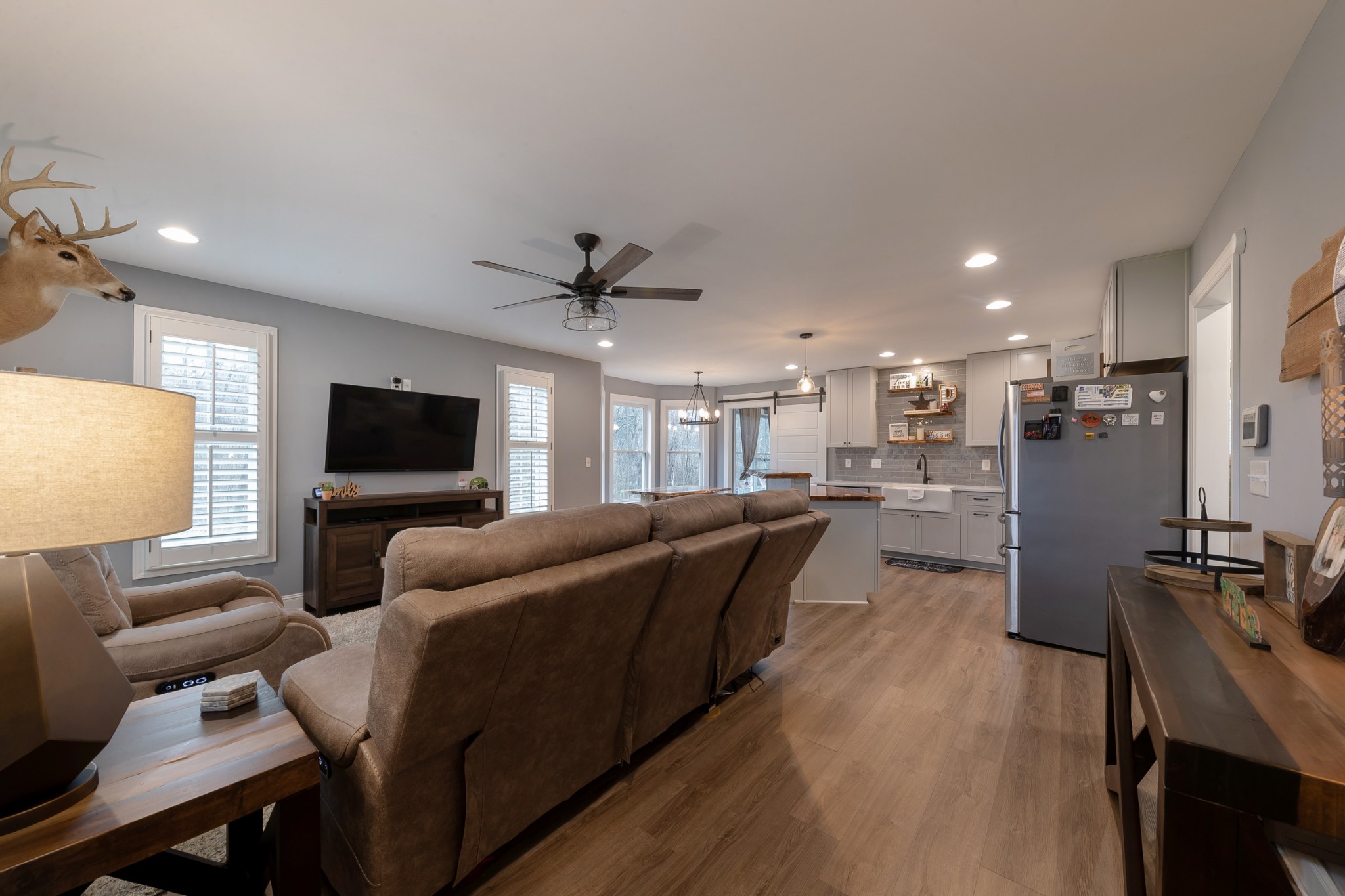 7452 South Swift Road Goodlettsville, TN 37072 - Photo 9 of 37 a living room with furniture and a flat screen tv