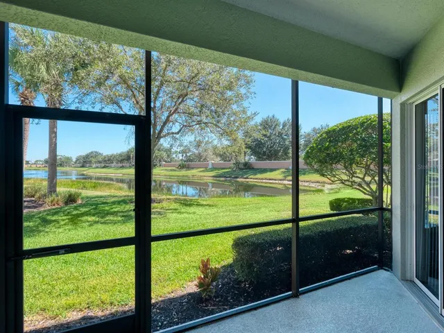 a balcony view with a seating space