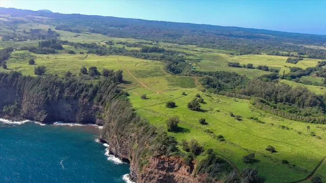 a view of a city with an ocean