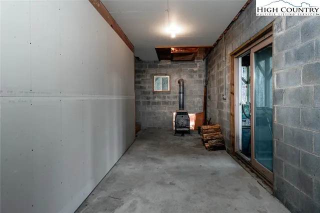 a view of a hallway with seating area