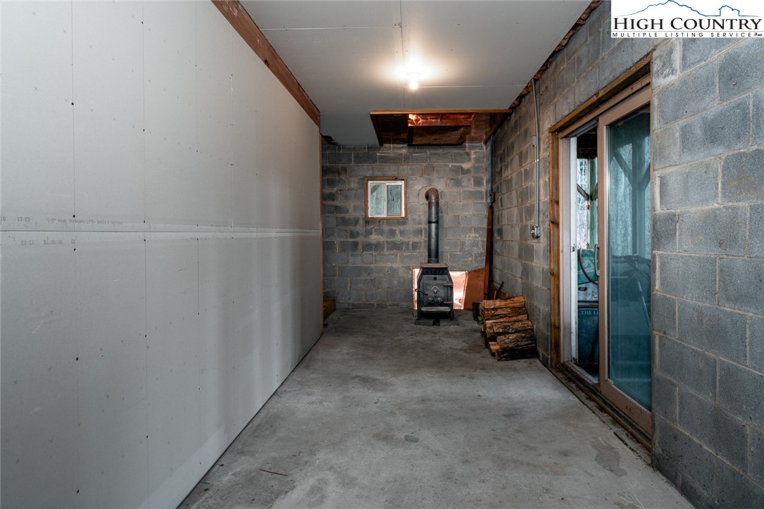 2417 Russell Norris Road Elk Park, NC 28622 - Photo 14 of 22 a view of a hallway with seating area