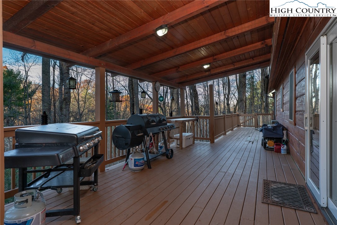 2417 Russell Norris Road Elk Park, NC 28622 - Photo 2 of 22 a view of a patio outdoor seating