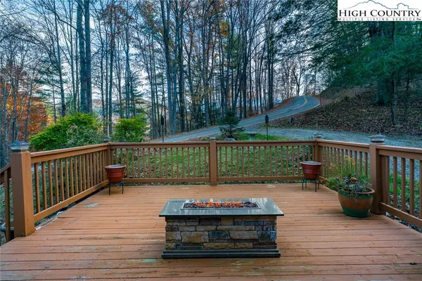 a view of a deck with a yard