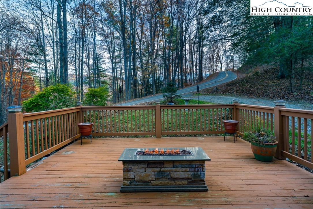 2417 Russell Norris Road Elk Park, NC 28622 - Photo 21 of 22 a view of a deck with a yard