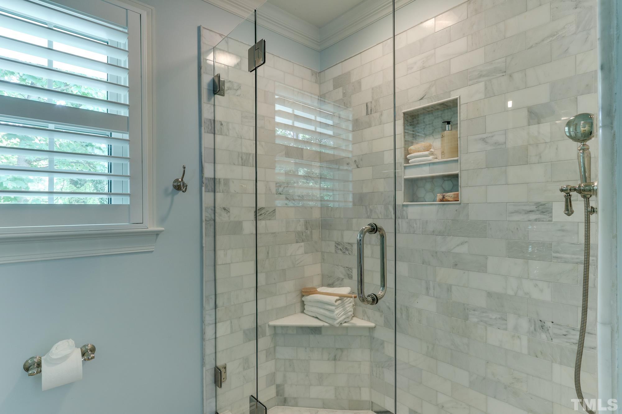 4804 Rampart Street Raleigh, NC 27609 - Photo 16 of 27 a bathroom with a shower