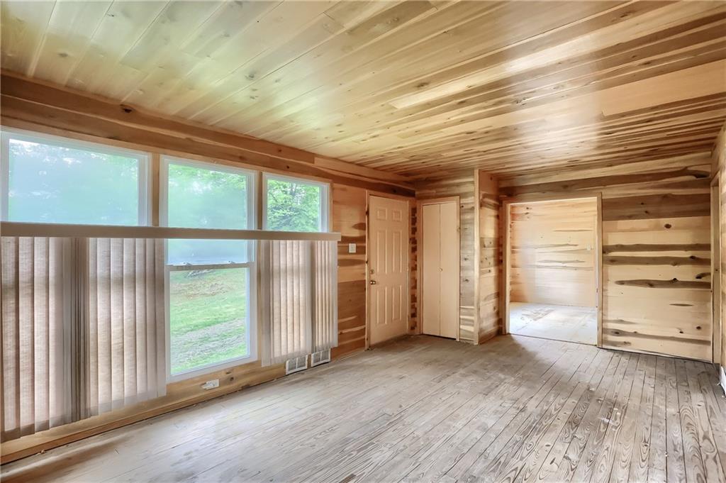 323 Boyers Road Harrisville, PA 16038 - Photo 16 of 25 Looking into the dining area from the well lit living room.