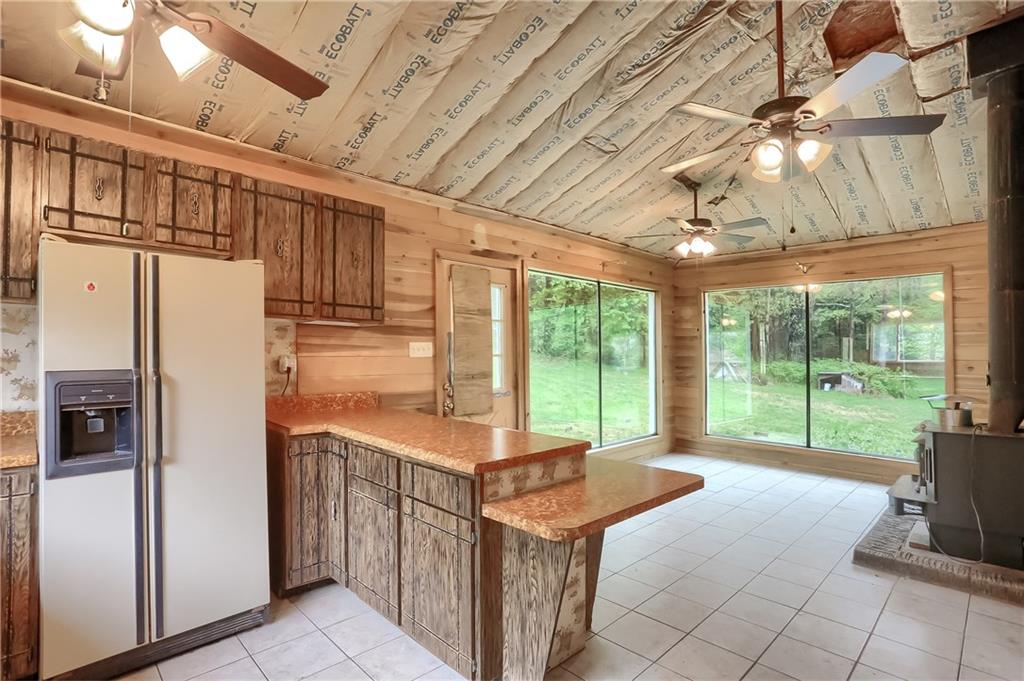 323 Boyers Road Harrisville, PA 16038 - Photo 10 of 25 Meal prep will be pleasant with the view of the private backyard.