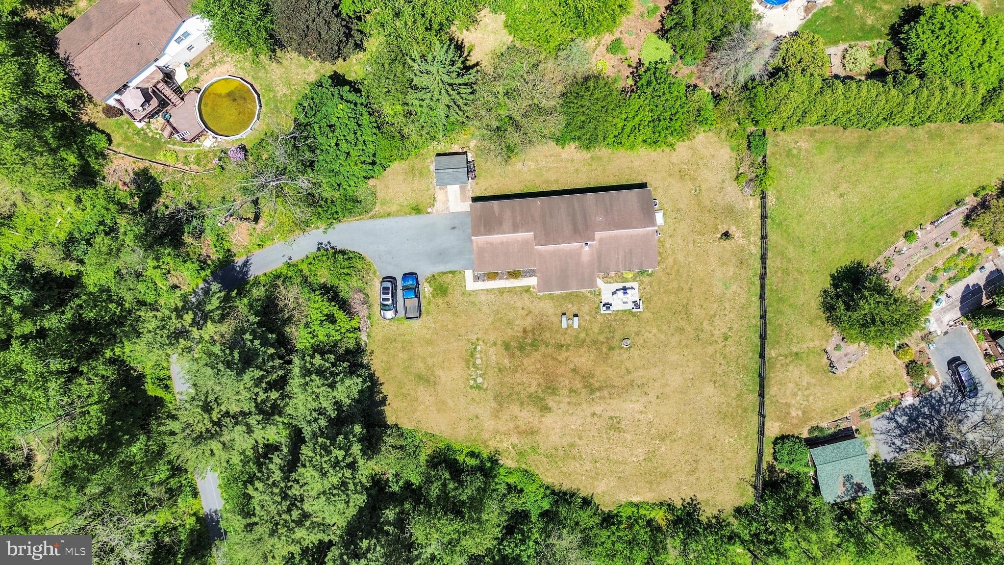 97 Bertolet Mill Road Oley, PA 19547 - Photo 32 of 35 an aerial view of a house with a yard