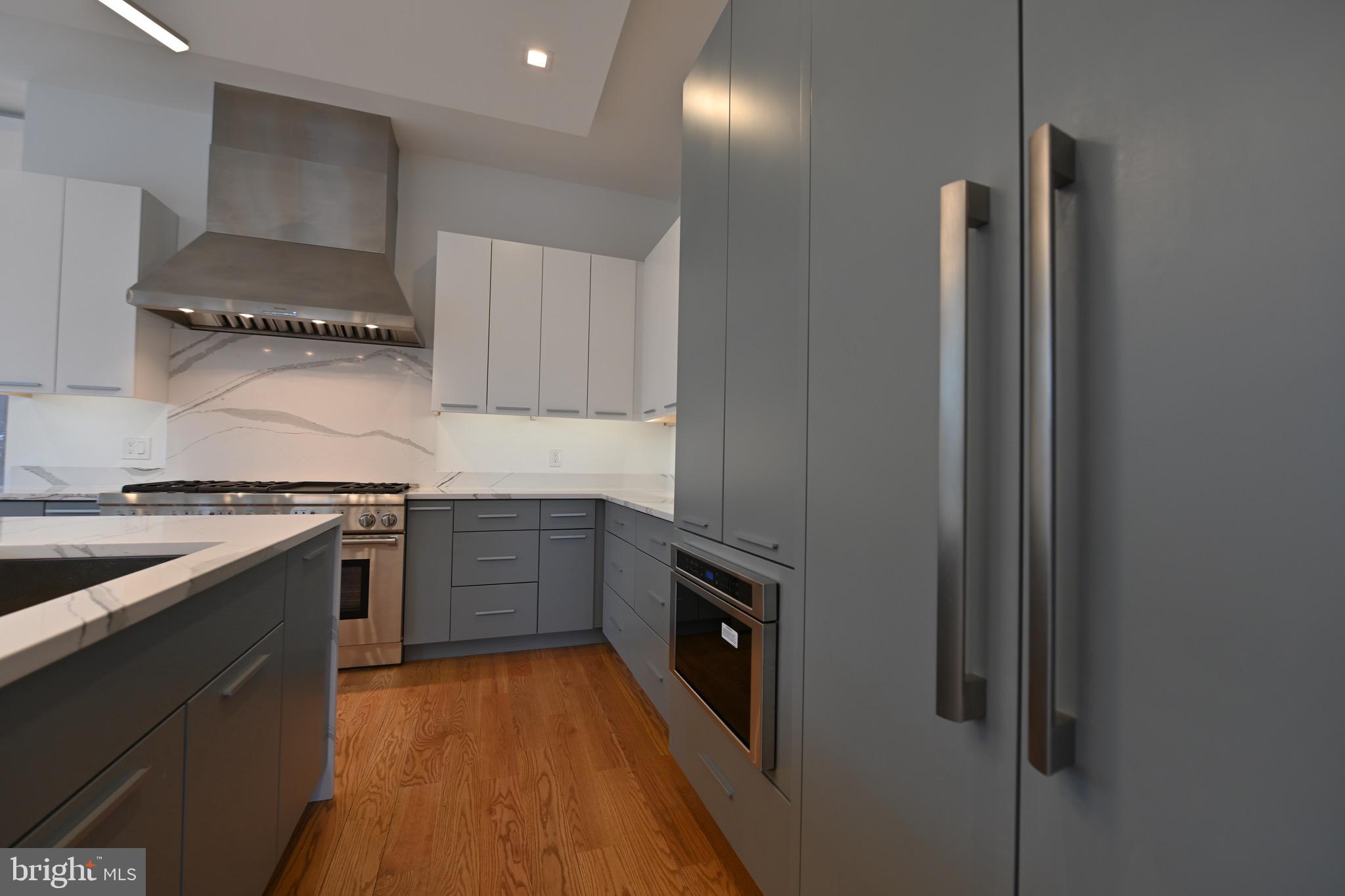 6210 Wedgewood Road Bethesda, MD 20817 - Photo 48 of 60 Modern design kitchen, waterfall island, Silstone