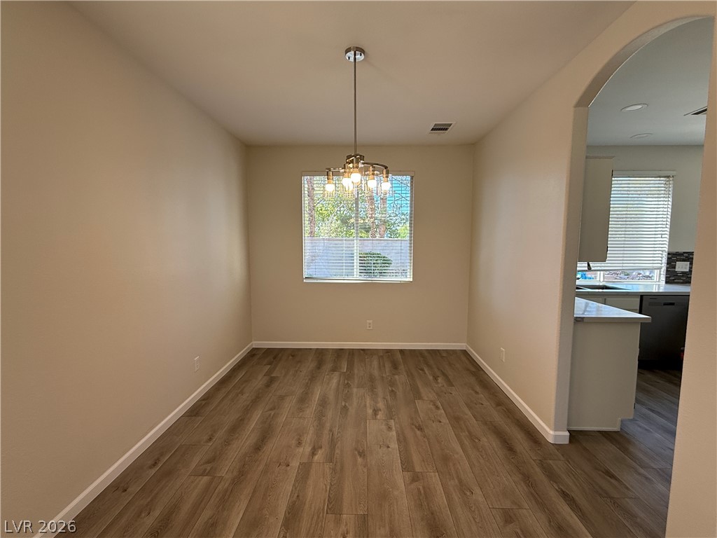 1908 Thunder Ridge Circle Henderson, NV 89012 - Photo 5 of 28 A streamlined dining space with durable flooring offers a seamless transition to the kitchen area.