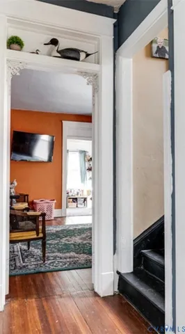 a living room with wooden floor