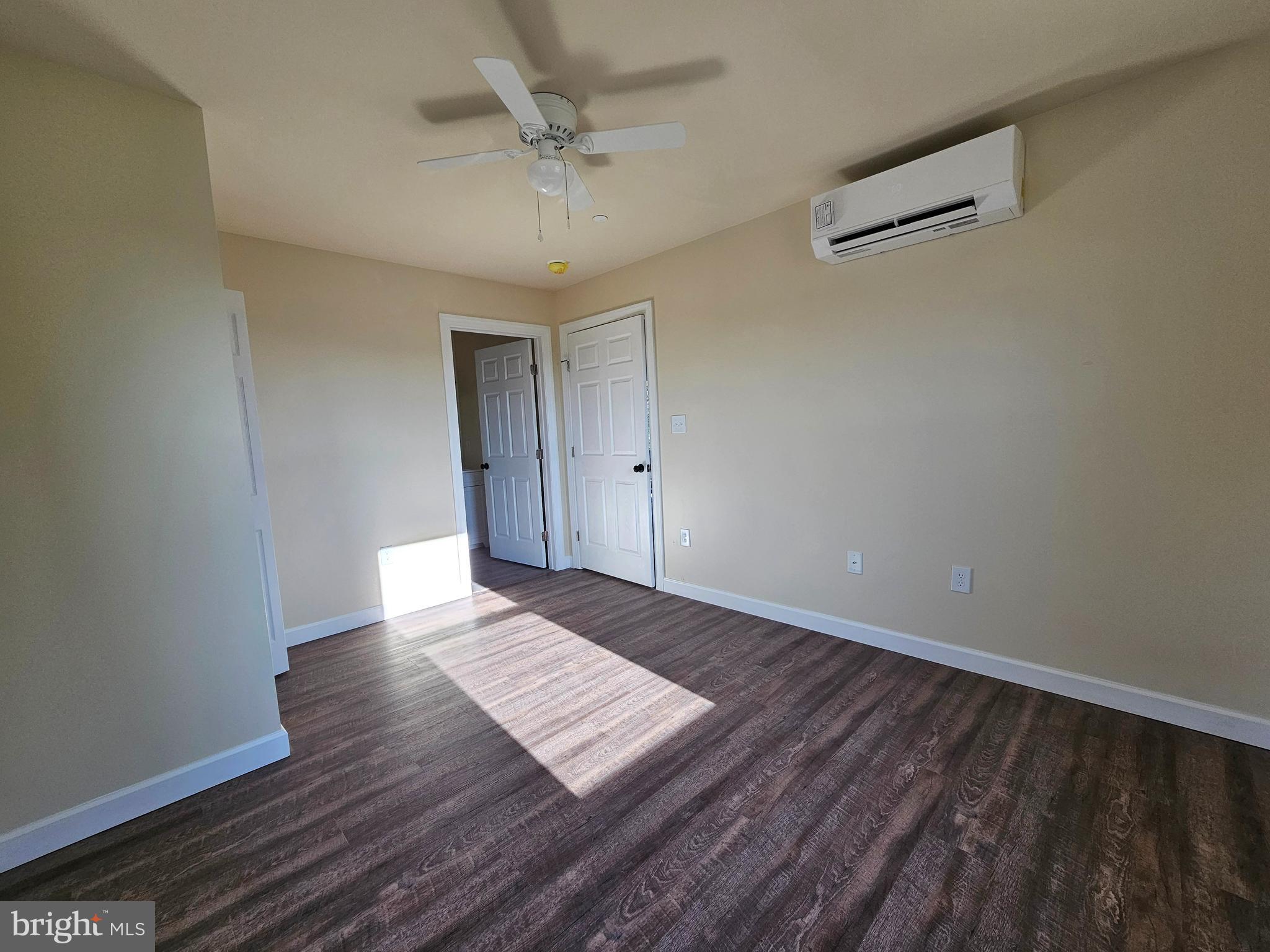 26404 Franklin Road Crisfield, MD 21817 - Photo 10 of 31 a view of an empty room and wooden floor
