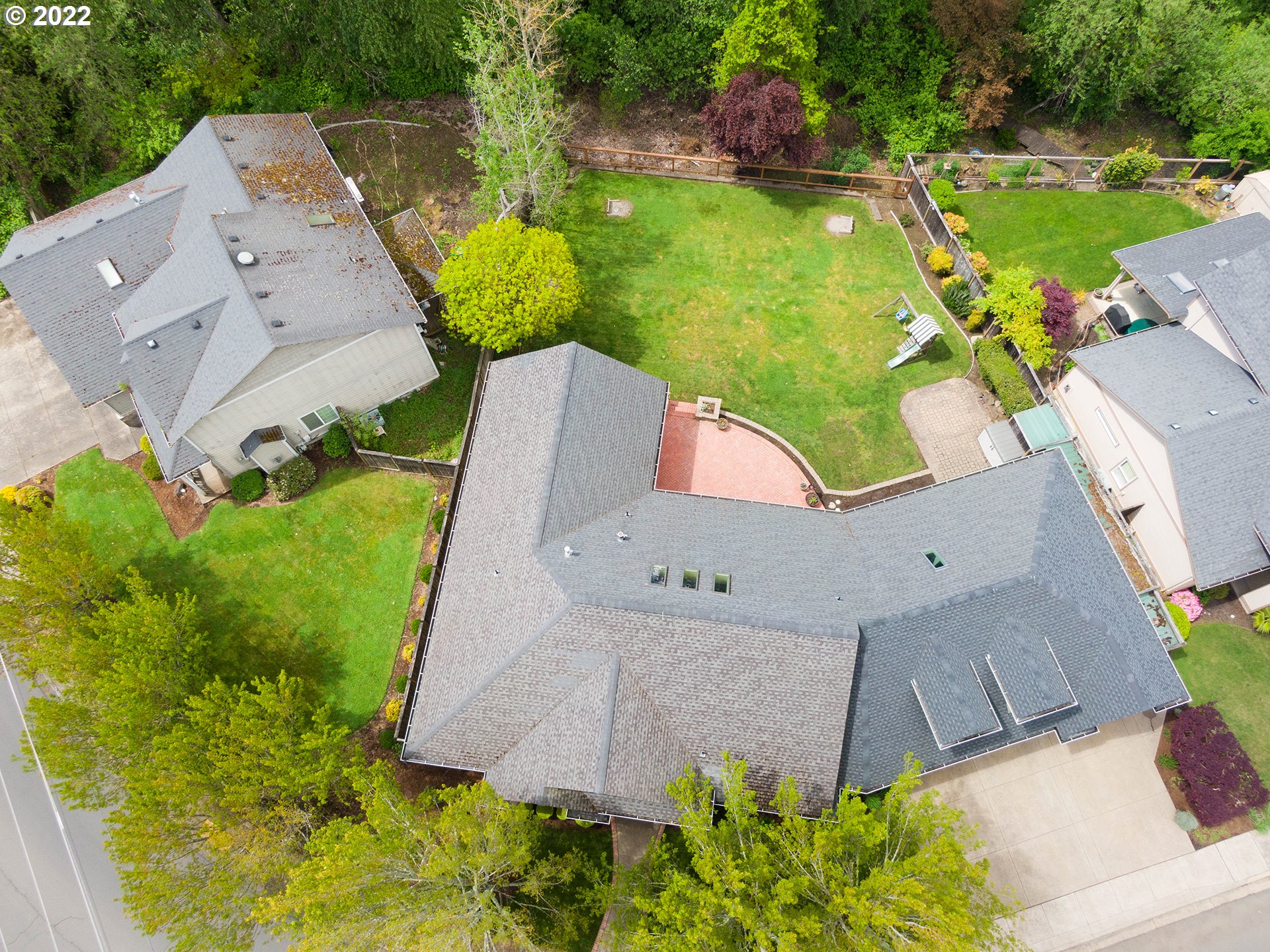 2258 33rd Street Springfield, OR 97477 - Photo 30 of 32 an aerial view of a house with a garden and trees
