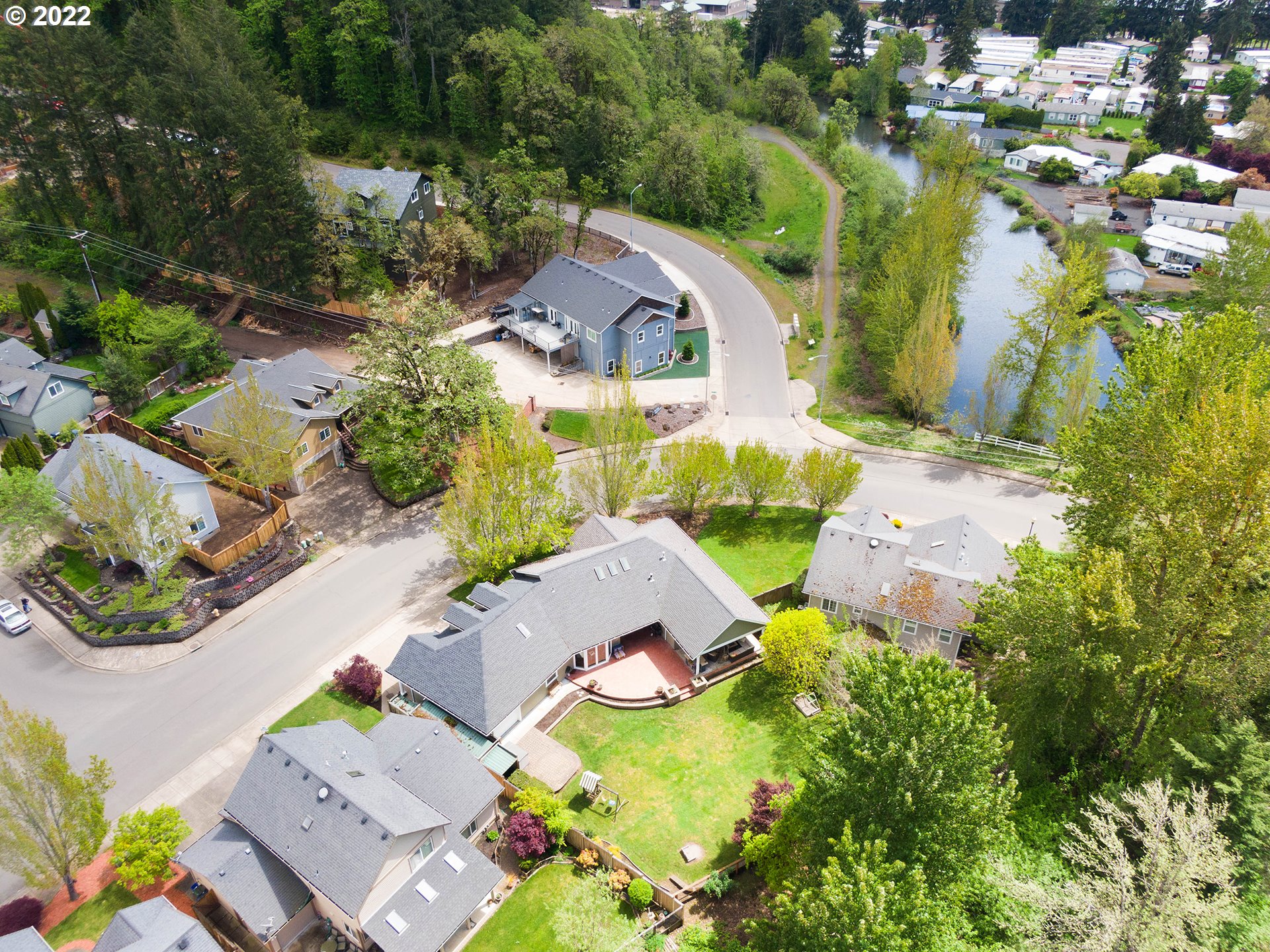2258 33rd Street Springfield, OR 97477 - Photo 32 of 32 an aerial view of a house with a swimming pool and outdoor space