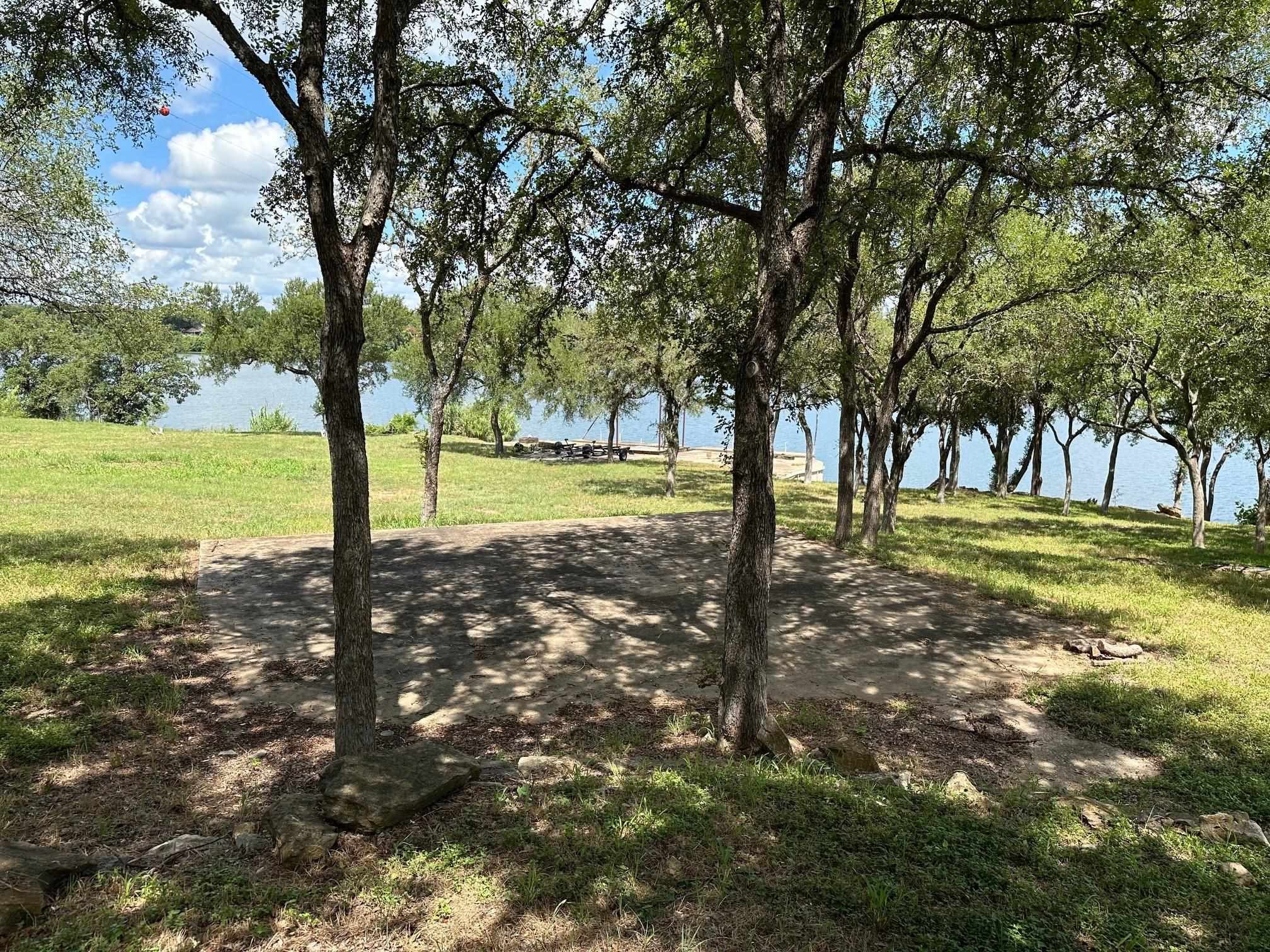 Unk Old River Road Marble Falls, TX 78654 - Photo 6 of 8 a view of a yard with a tree