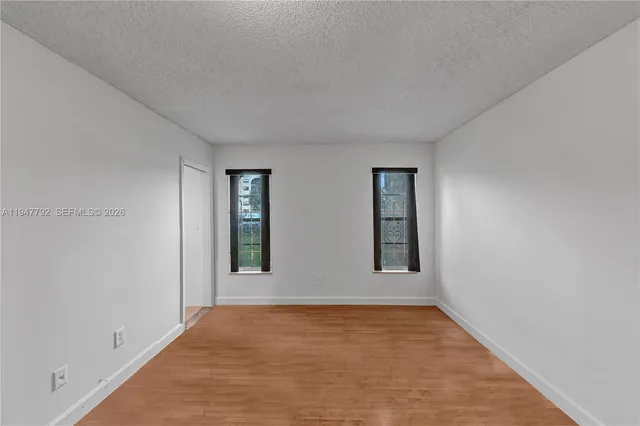 an empty room with windows