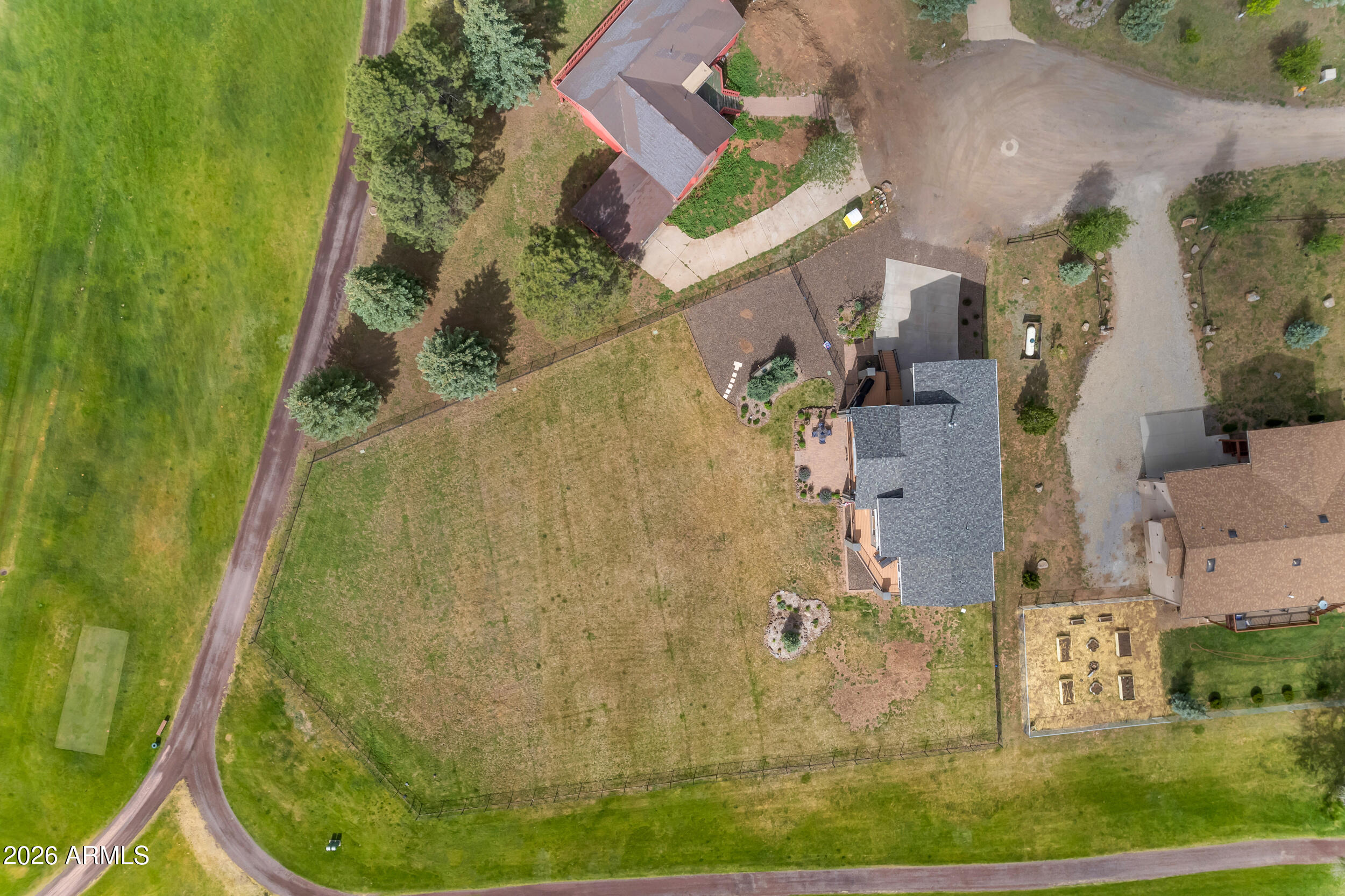 17975 Hopi Road Munds Park, AZ 86017 - Photo 52 of 58 an aerial view of a house with a yard