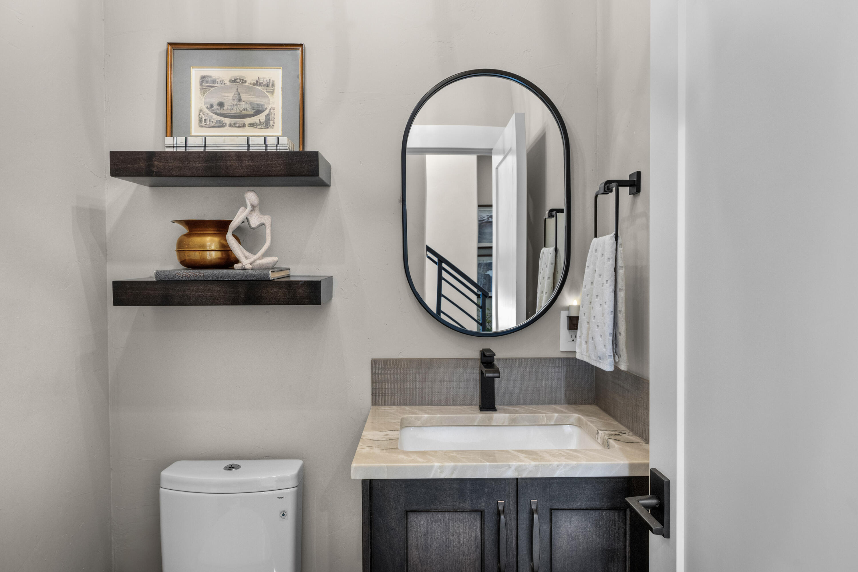 19460 Chip Shot Lane Bend, OR 97702 - Photo 22 of 56 a bathroom with a toilet and a sink