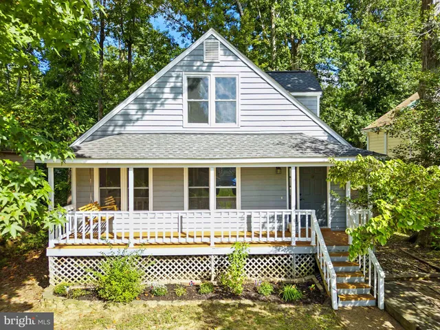 a front view of a house with a patio