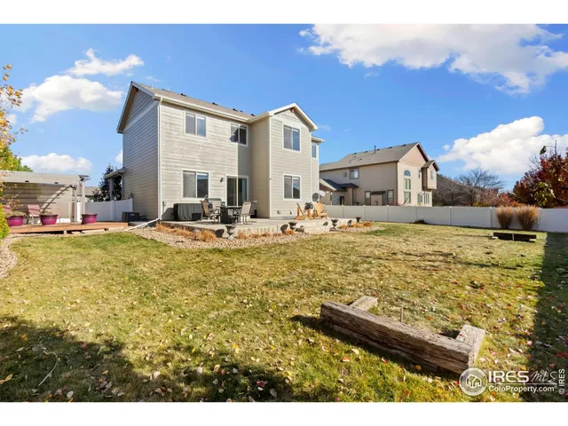 a view of a yard with furniture