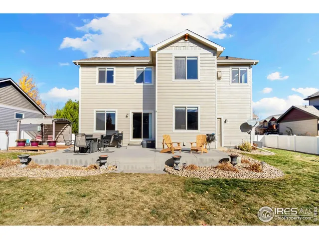 a view of swimming pool with outdoor seating and stairs
