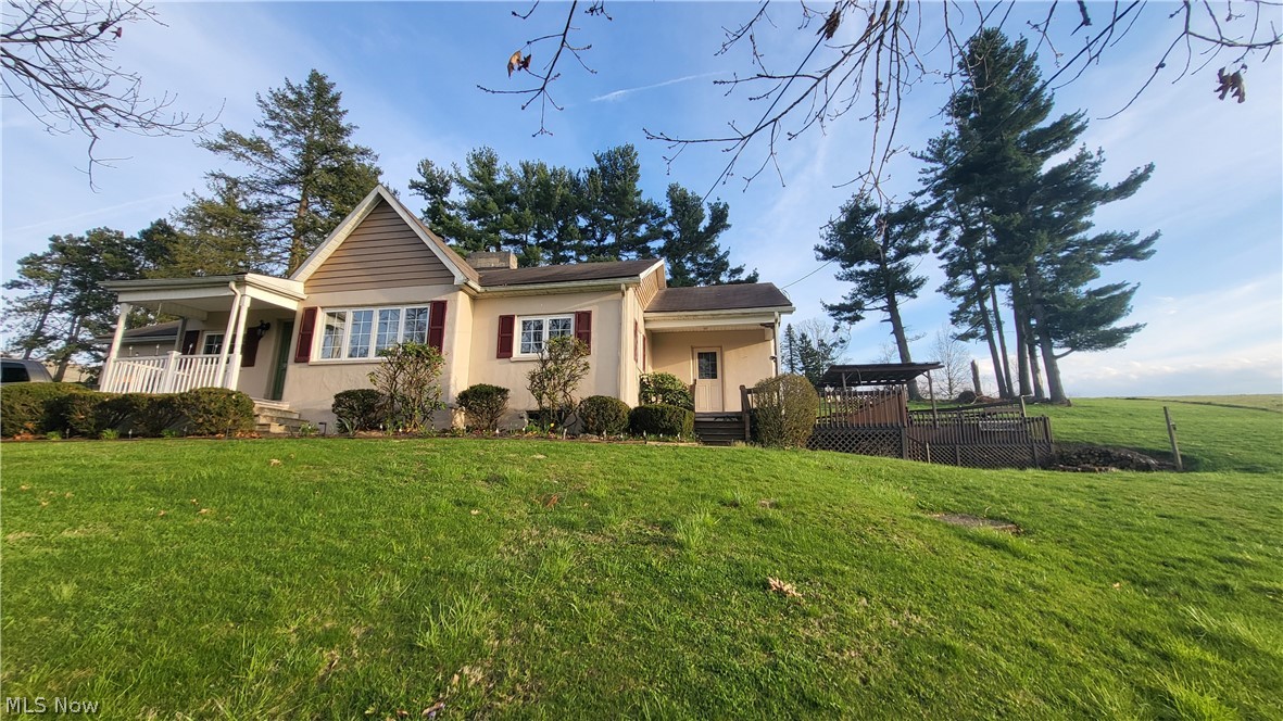 72238 Colerain Road Bridgeport, OH 43912 - Photo 6 of 30 View of front of house featuring a front lawn