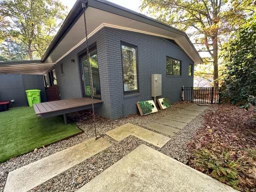 3322 Ocotea Street Raleigh, NC 27607 - Photo 20 of 31 a front view of a house with garden