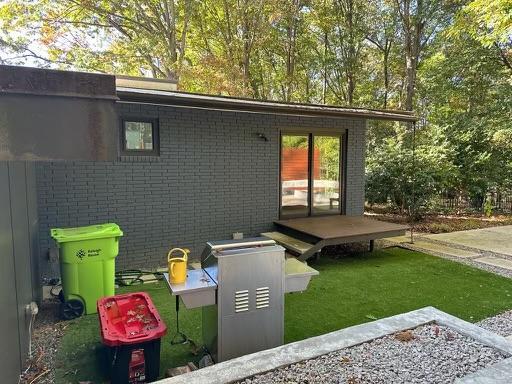 3322 Ocotea Street Raleigh, NC 27607 - Photo 22 of 31 a front view of a house with garden