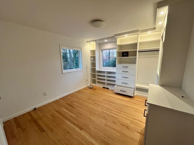 3322 Ocotea Street Raleigh, NC 27607 - Photo 24 of 31 a view of room with wooden floor and windows