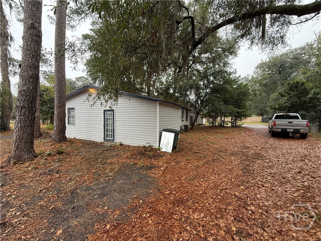 316 Edgewater Road Savannah, GA 31406 - Photo 2 of 13 Back of house 316 sitting in front of lot.