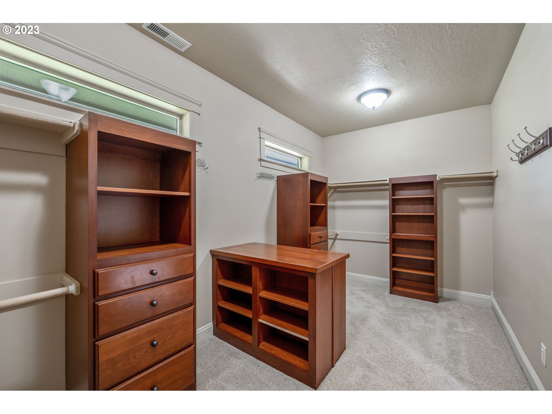 6143 Forest Ridge Drive Springfield, OR 97478 - Photo 20 of 48 a view of walk in closet with clothes and shoes