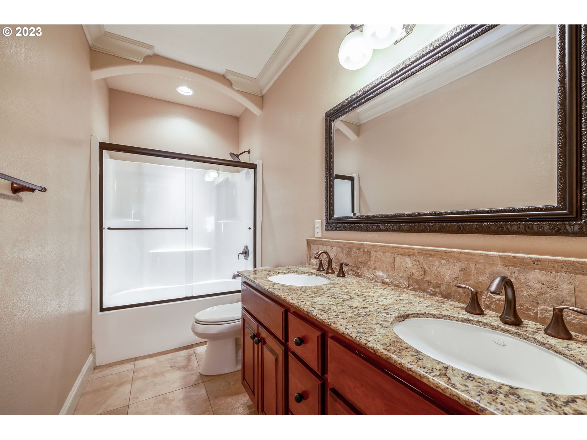 6143 Forest Ridge Drive Springfield, OR 97478 - Photo 30 of 48 a bathroom with a granite countertop sink mirror vanity and toilet