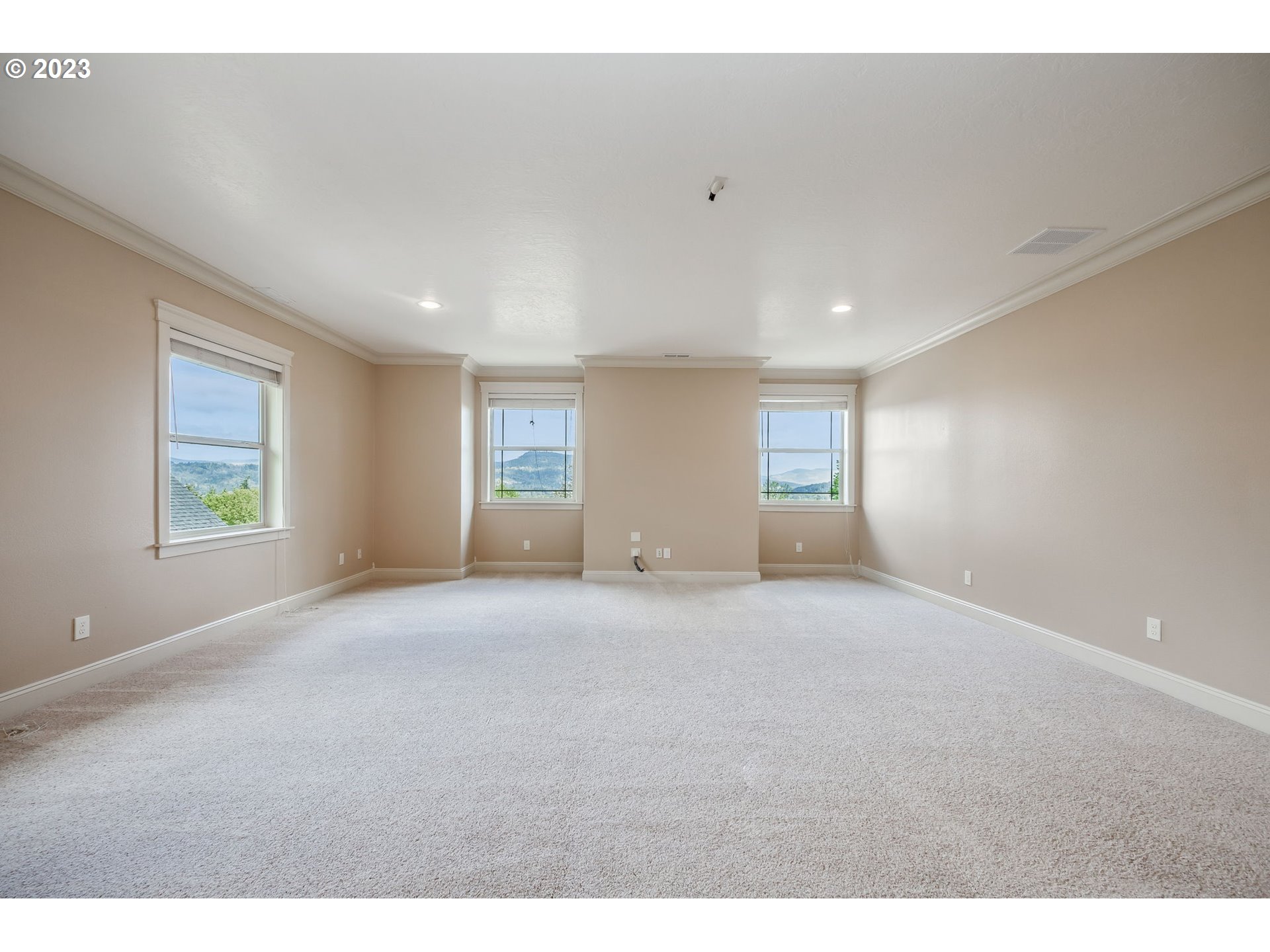 6143 Forest Ridge Drive Springfield, OR 97478 - Photo 32 of 48 a view of empty room with windows