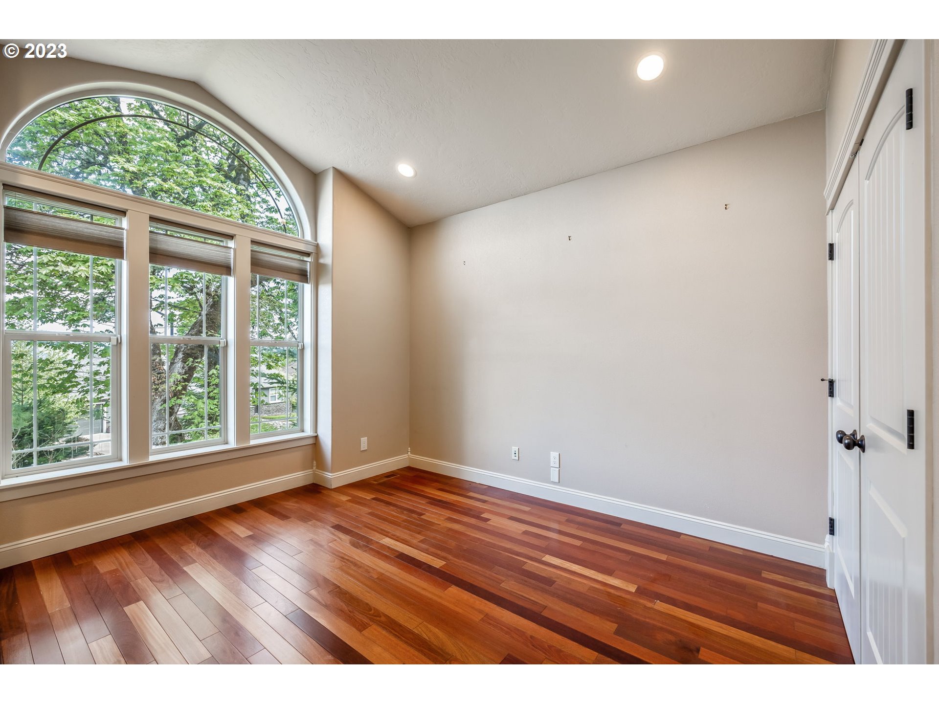 6143 Forest Ridge Drive Springfield, OR 97478 - Photo 7 of 48 wooden floor in an empty room with a window