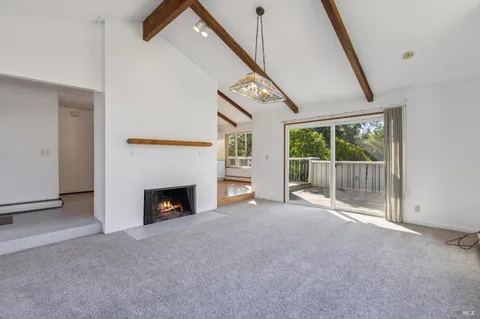 a view of a town with mountains in the background