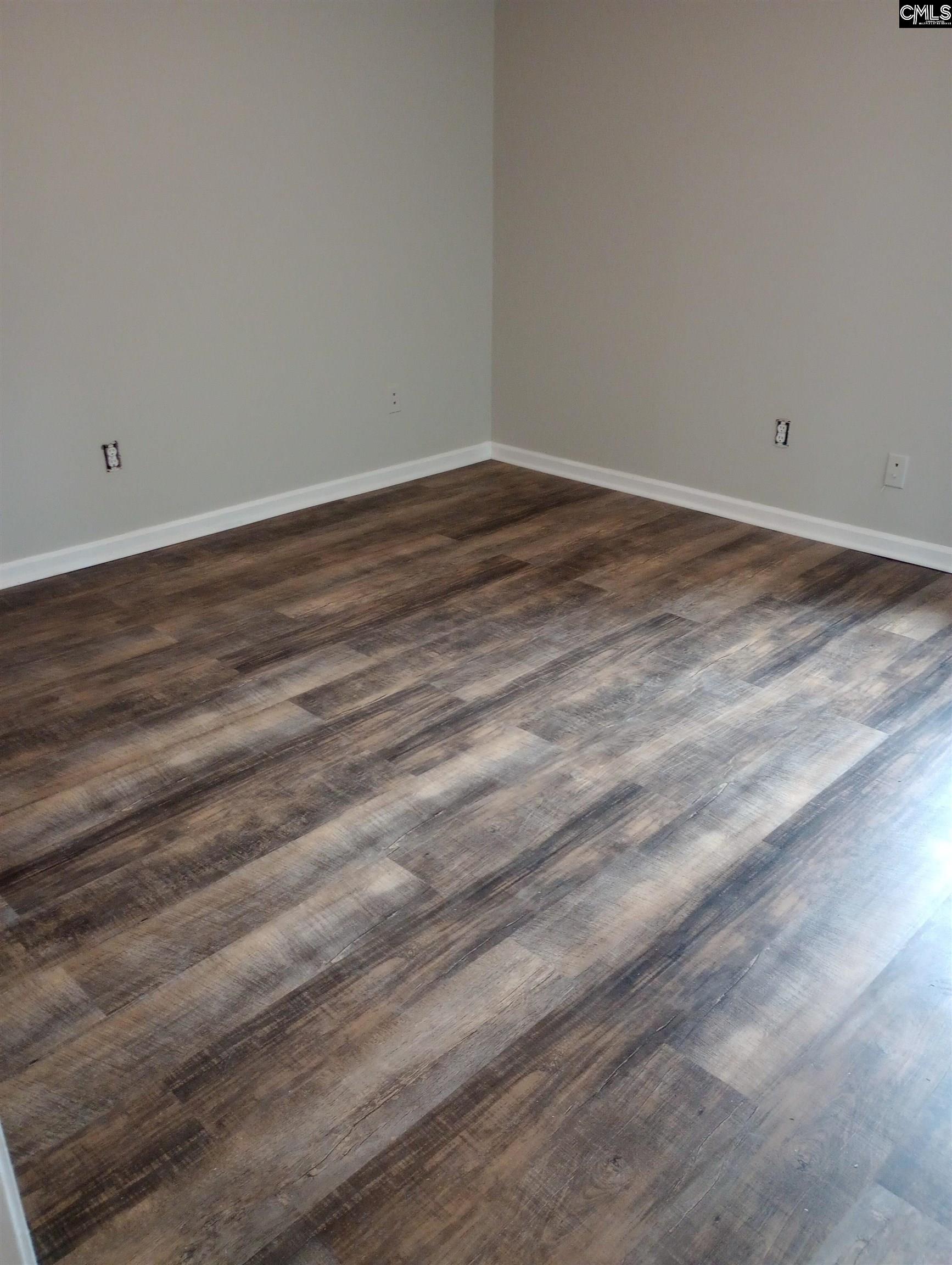 2444 Watson Street, Unit B Elgin, SC 29045 - Photo 5 of 5 a view of an empty room with wooden floor
