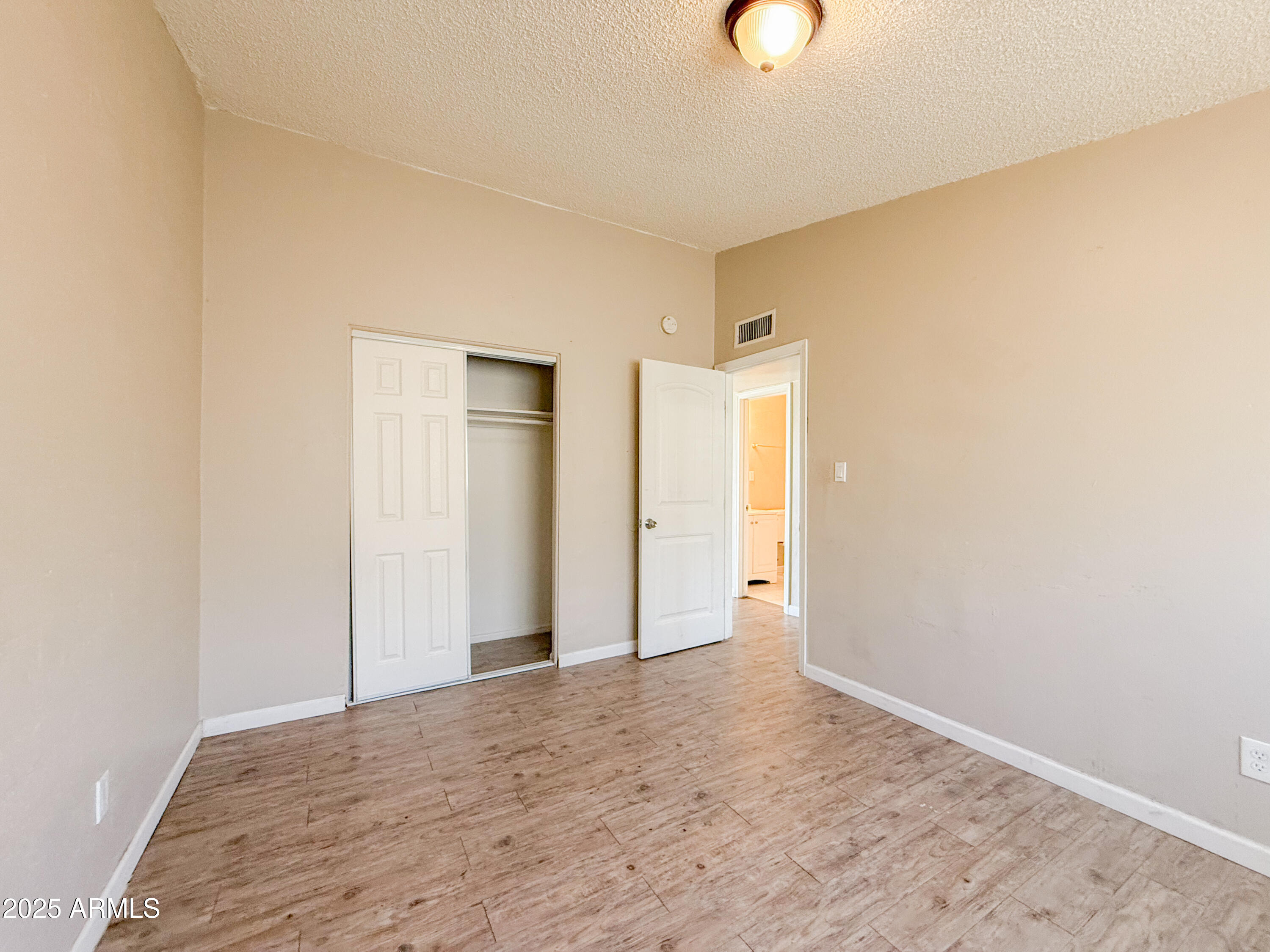 2123 West Devonshire Avenue, Unit 15 Phoenix, AZ 85015 - Photo 12 of 14 a view of an empty room