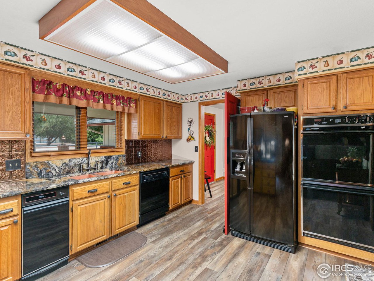 13581 Elmore Road Longmont, CO 80504 - Photo 8 of 34 Kitchen
