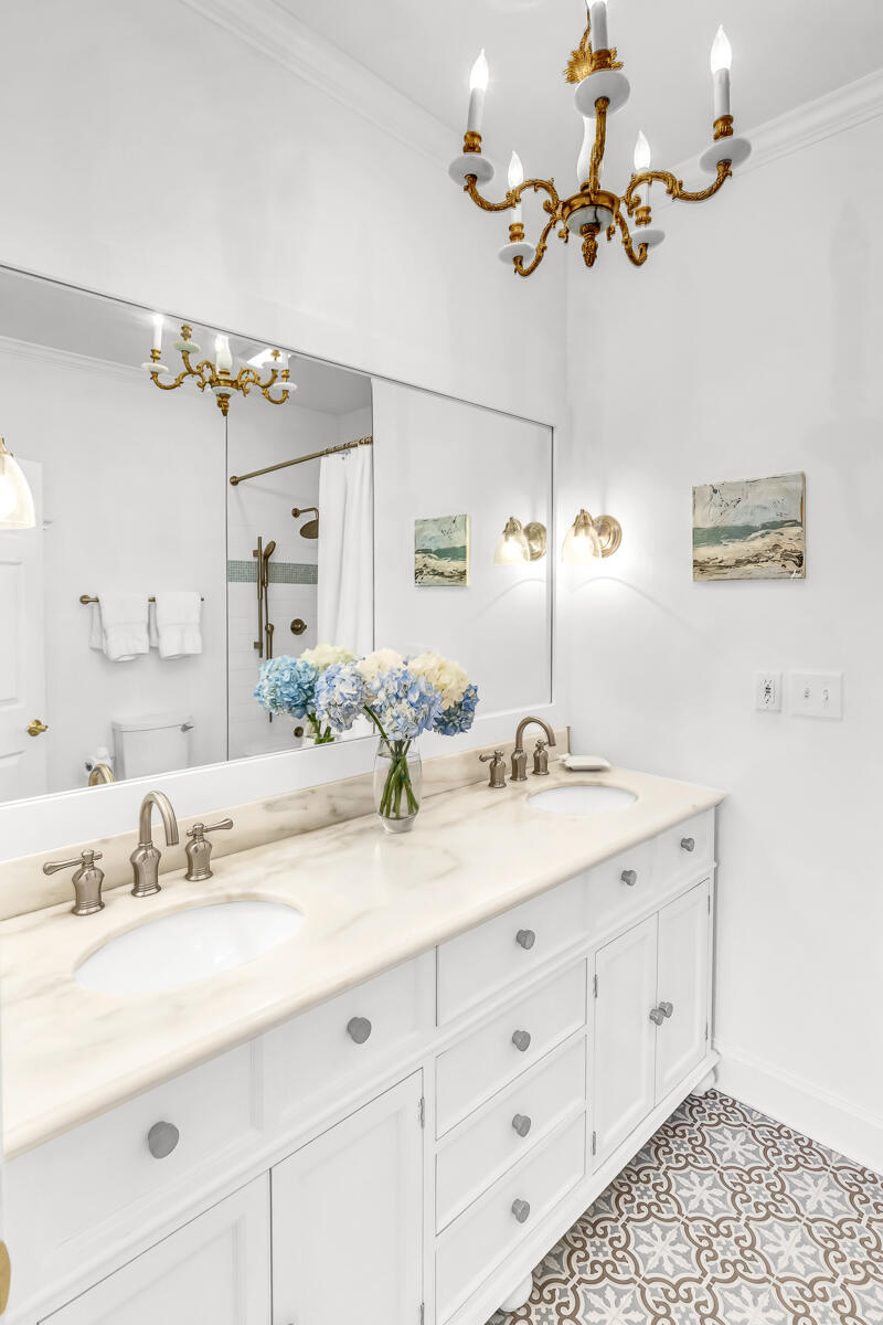 79 Redfish Circle Santa Rosa Beach, FL 32459 - Photo 11 of 33 a bathroom with a double vanity sink and a mirror