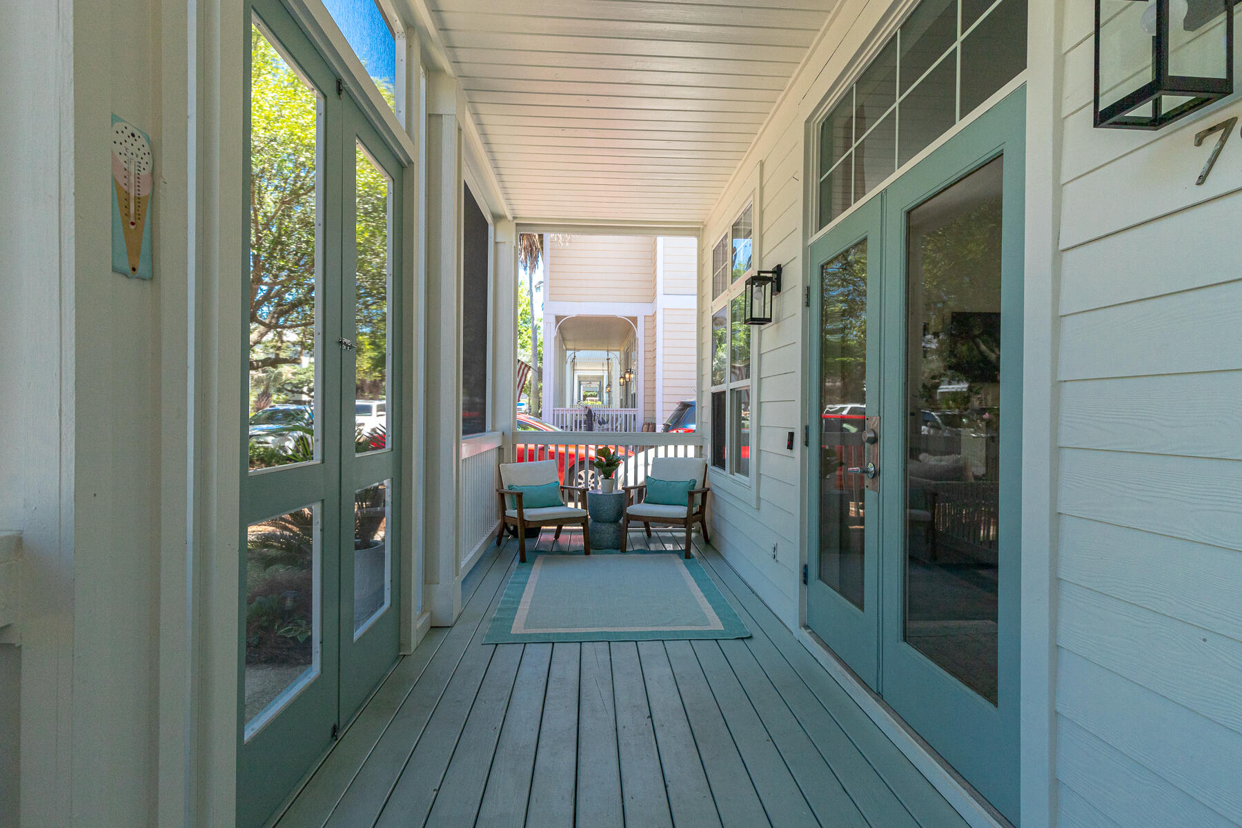 79 Redfish Circle Santa Rosa Beach, FL 32459 - Photo 24 of 33 a view of a balcony with wooden floor and furniture