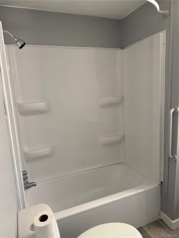 a bathroom with a bathtub