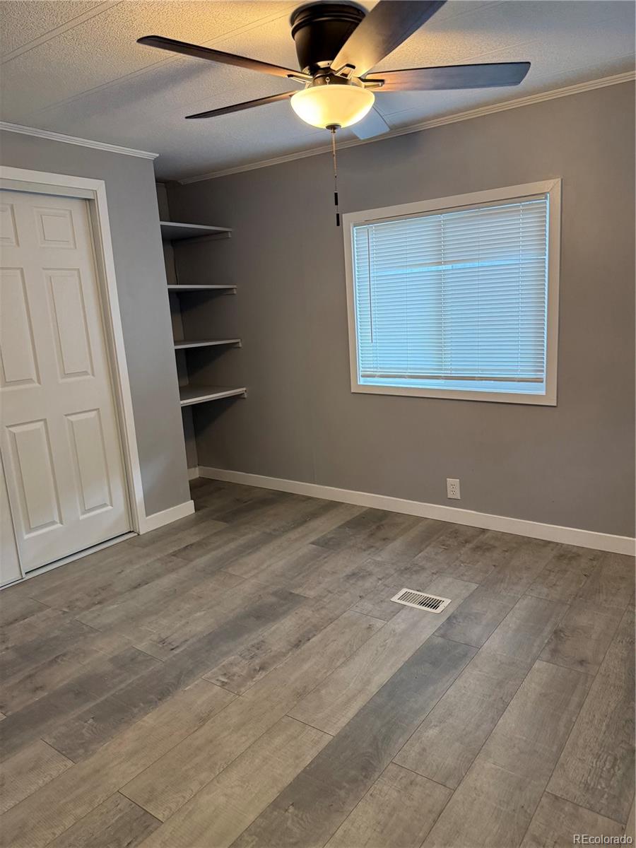 17190 Mt Vernon Road, Unit 176 Golden, CO 80401 - Photo 14 of 39 a view of a room with a ceiling fan