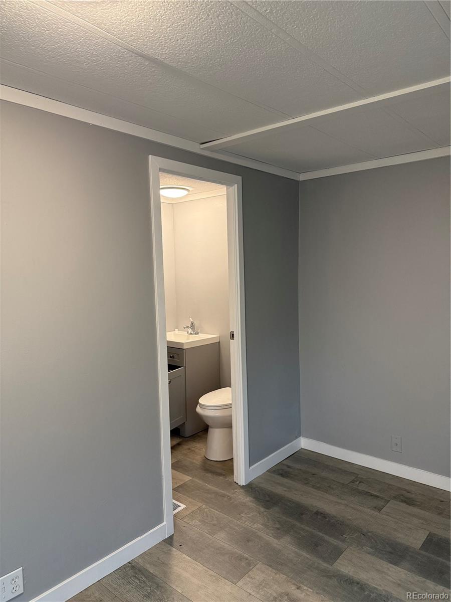 17190 Mt Vernon Road, Unit 176 Golden, CO 80401 - Photo 15 of 39 a bathroom with a toilet